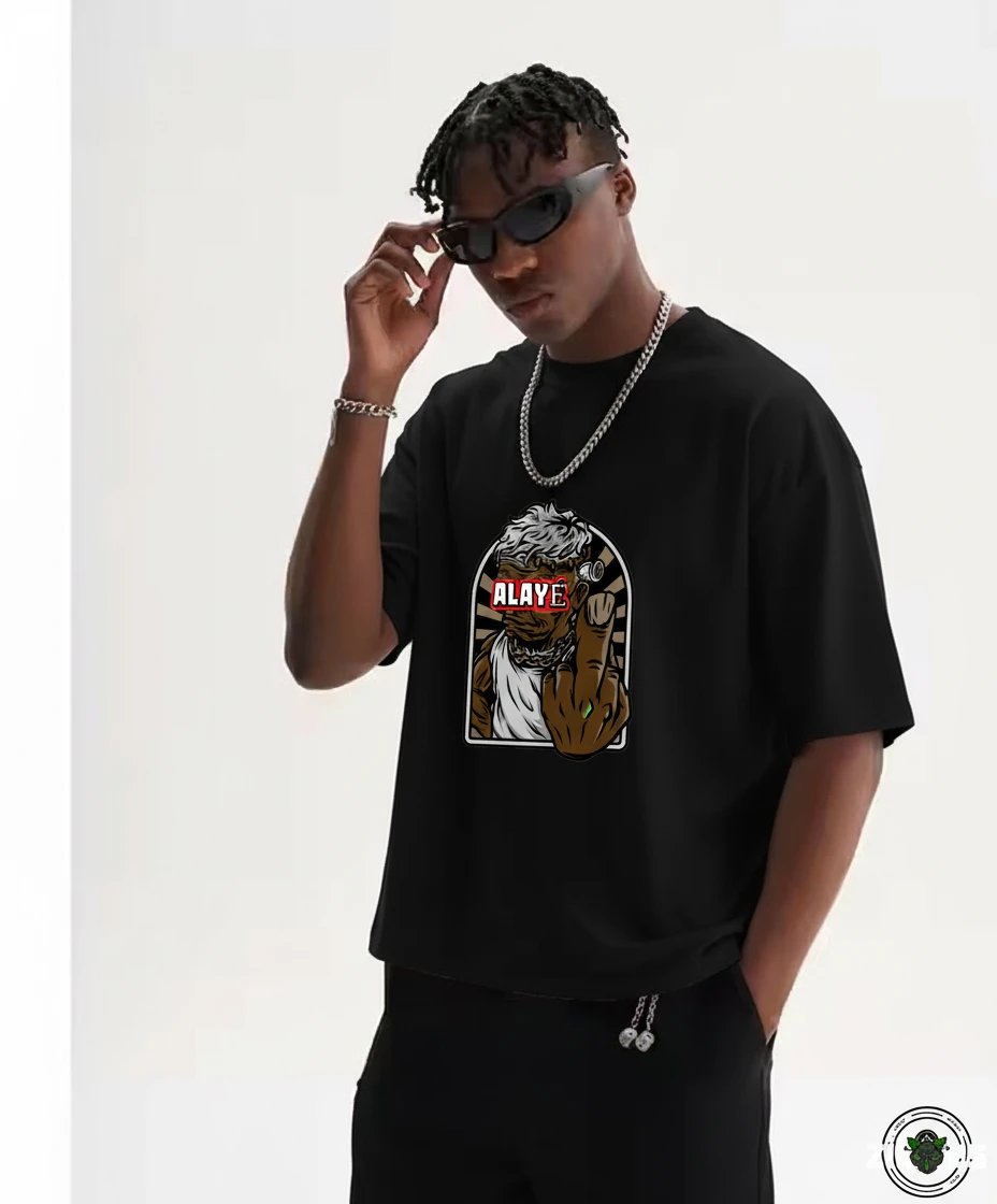 Streetwear styling with a graphic tee, beanie and sunglasses