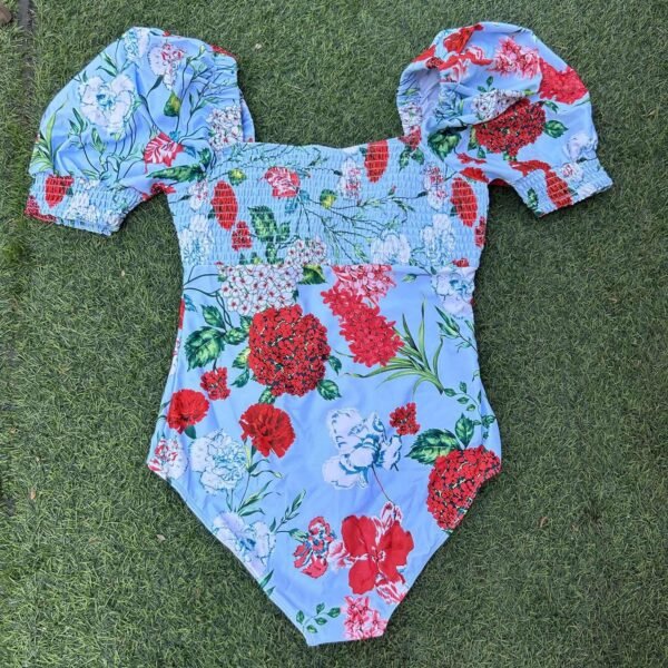 Retro Floral Swimsuit And Wrap Skirt Set, best boutique in Lagos, best boutique in Ikeja, buy woman clothes in lagos, shop clothes online, buy male clothes, instagrm shop, legit instagram shop, legit instagram clothes vendor, instagram vendor in Lagos, buy clothes with bitcoin in Lagos